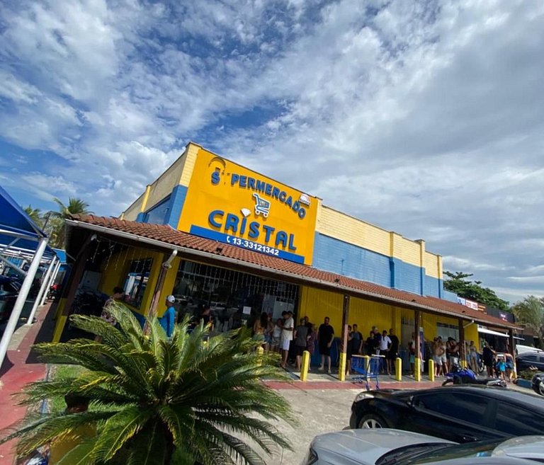 Casa na praia em condomínio com piscina e ar-condicionado