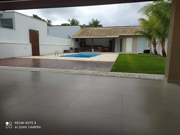 Casa na Praia com Piscina Aquecida em Condominio